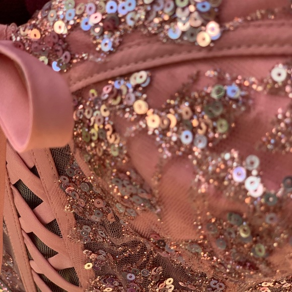 Glitter Mesh Corset Tiered Ballgown with Sequin and Ruffle Detail.
Prom dress. - Picture 10 of 17